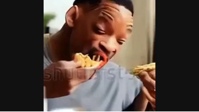 Preview still from the 2023 synthetic Will Smith spaghetti clip, showing distorted facial features.
